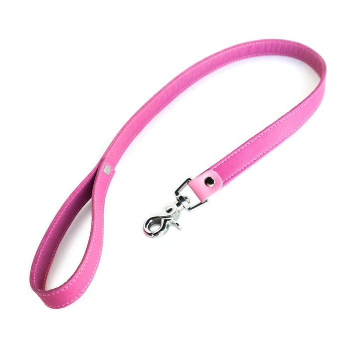 The hot pink Breast Cancer Awareness Premium Garment Leather Leash is displayed against a blank background. The leash has a wrist loop at one end and a metal claw hook at the other and has light pink accent stitching and lighter pink leather accents.