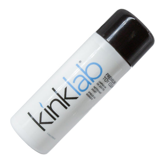 A bottle of KinkLab Premium Toy Cleaner is displayed against a blank background. The bottle is white with the KinkLab logo on it with a black cap.
