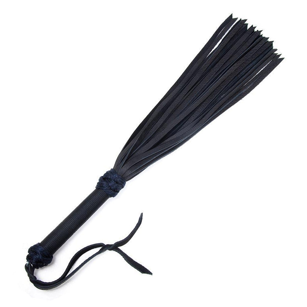 The black/black 30-inch Buffalo Hide Flogger is displayed against a blank background. The flogger has black leather falls, and the handle is wrapped in black nylon with knots at the top and bottom and a black leather wrist loop at the base of the handle.