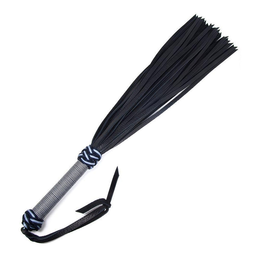 The silver/black 30-inch Buffalo Hide Flogger is displayed against a blank background. The flogger has black leather falls, and the handle is wrapped in silver and black nylon with knots at the top and bottom and a black leather wrist loop at the base of the handle.