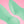 Load image into Gallery viewer, A closeup of two Fun Factory Sundaze Pulsating Vibrators in Pistachio are shown against a pink background, displaying the contours of the tip of the toy. 
