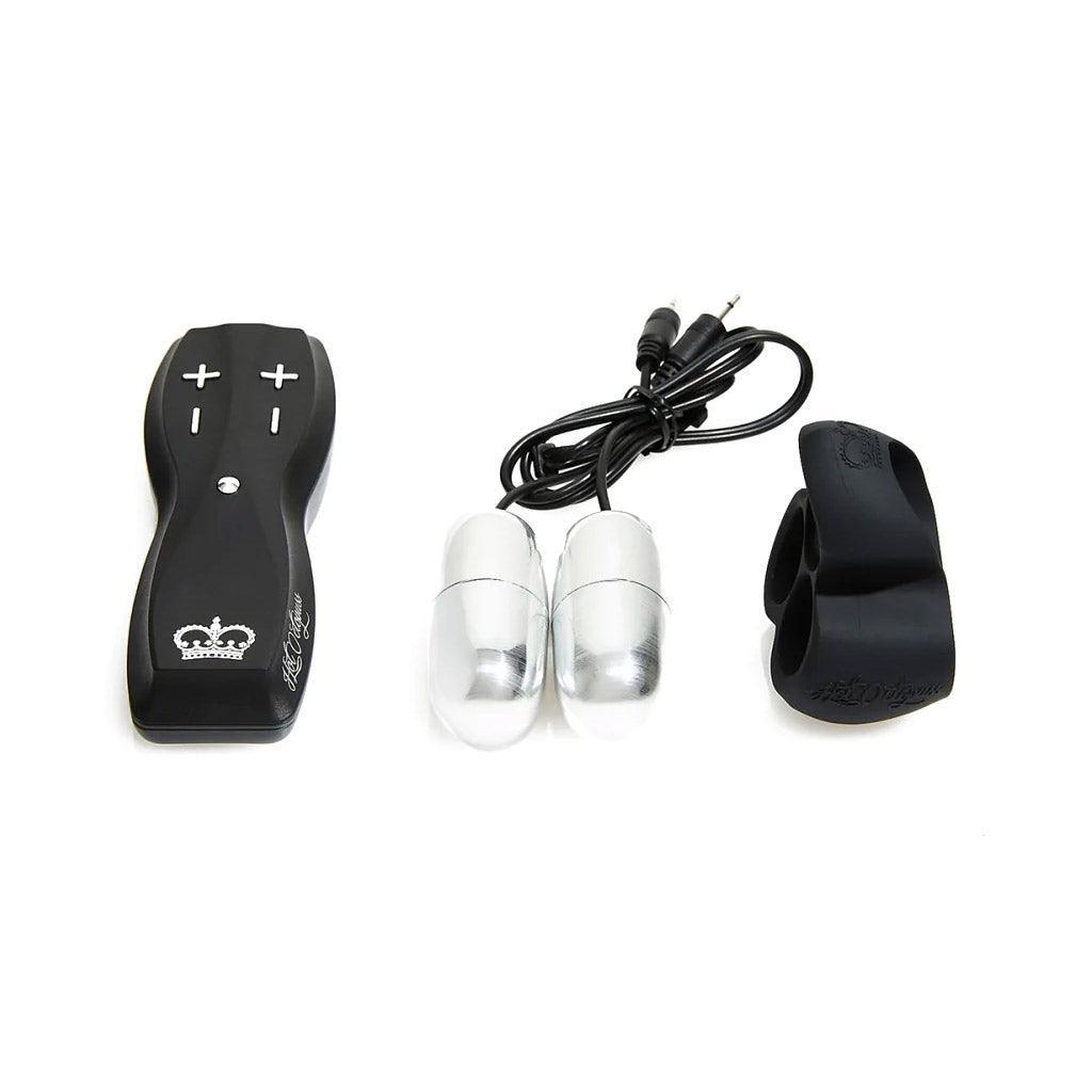 The parts of the Hot Octopuss Jett Penis Vibrator are shown against a blank background. The cockring, vibrators, and remote are all shown next to each other and disconnected.