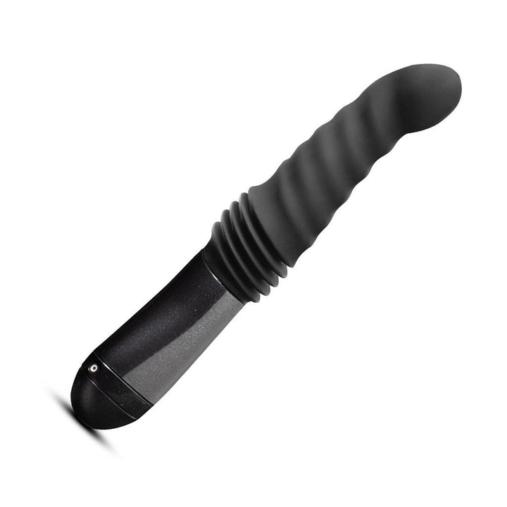 An image of the Temptasia Lazarus Thrusting Rechargeable Vibrating Dildo in Black by Blush Novelties on a plain white background. 