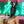 Load image into Gallery viewer, A nude woman reclines in front of a green and red neon sign. She wears the black Leather Bunny Hood, which covers her face and head and ties with a black bow around her neck. The hood has large ears, red eyes, a red nose, and a small opening over the mouth.
