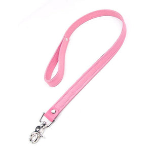 The pink BDSM 2.5' Premium Garment Leather Leash is shown against a blank background. The leash is made of a strip of pink garment leather looped into a handle on one end and with a metal snap hook on the other.