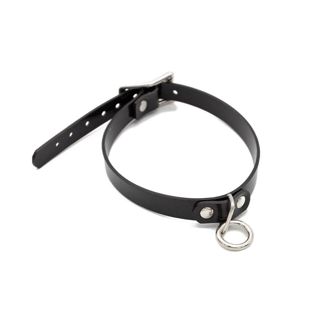 A buckled Stockroom Black PVC Choker with an O-Ring is shown against a blank background.