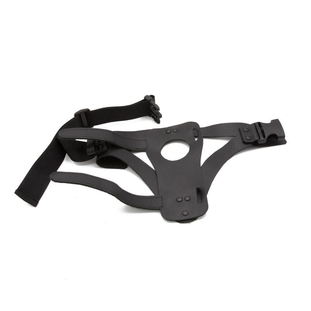 The Wand Thigh Harness made by The Stockroom is shown displayed with the KinkLab VibeRite Personal Wand Massager in front of a white background.