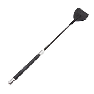The Short Riding Crop With A Wide End is displayed against a blank background. The crop is made of black leather with a black leather handle, and the rod is wrapped in black braided nylon.