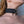 Load image into Gallery viewer, A close-up of the neck of a woman wearing the Silicone Locking Collar is shown.
