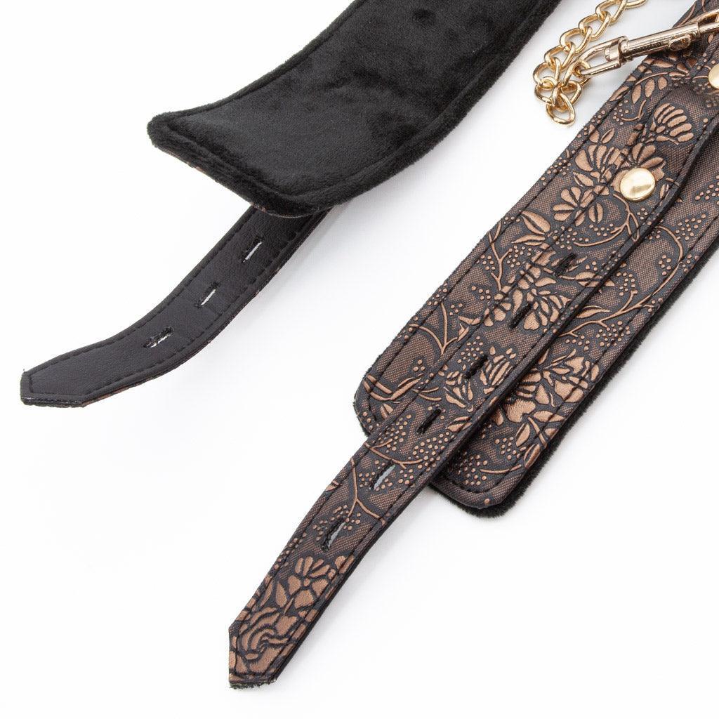 A pair of uncuffed Vegan Floral Ankle Cuffs With Faux Fur are displayed against a blank background.