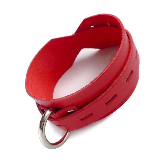A red leather collar sitting on a white background, positioned to show the D-Ring in front and the inner surface.