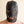 Load image into Gallery viewer, A person&#39;s head is shown in the Premium Leather Hood with a Gag and Blindfold against a beige background. The blindfold and gag have been removed, revealing holes for the person&#39;s eyes and mouth.
