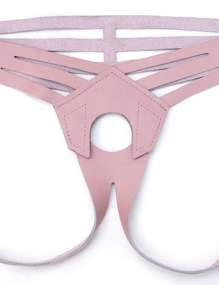 A close-up of the pink Vanity Strapon Dildo Harness is displayed against a blank background.