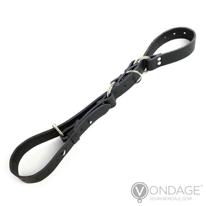The Vondage Hobble Belt Bondage Device is shown against a blank background. The strap is woven through the D-rings on the belt in order to form two loops.