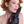 Load image into Gallery viewer, A topless woman with short, curly red hair is shown looking upward against a blank background. She is wearing the Vampire Gloves and cups her face with one hand while the other holds her wrist.

