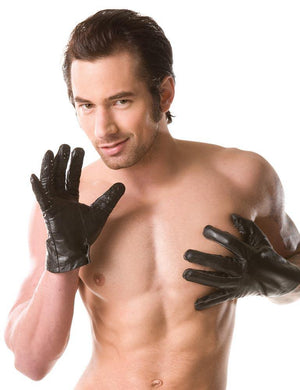 A shirtless man with brown hair wearing Vampire Gloves is shown against a blank background. One of his hands rests on his chest. The other hand is raised with his palm turned towards the camera, showing the spikes on the glove.
