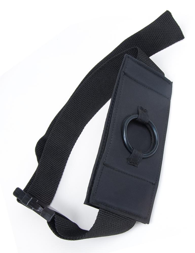 The Malibu Thigh-On Dildo Harness is displayed against a blank background. It is made of a black nylon strap with a wider, rectangular, fabric-covered piece in the center, which has a black O-ring. 