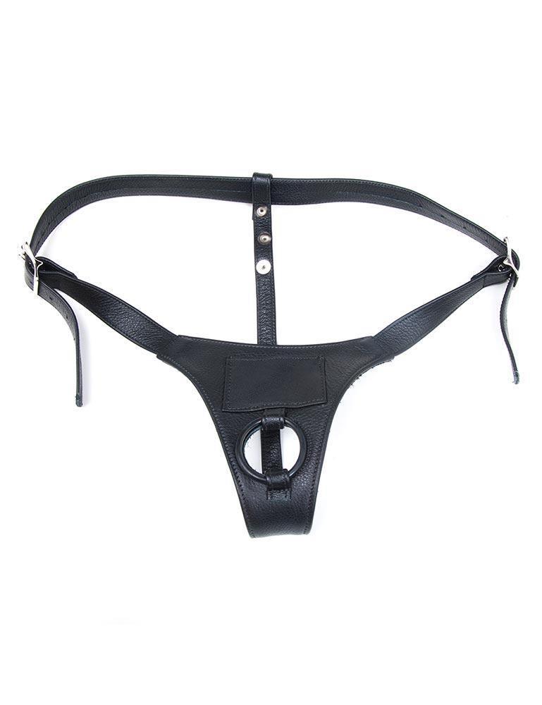 The black leather Buzz Me Tender strap-on harness is shown against a blank background.