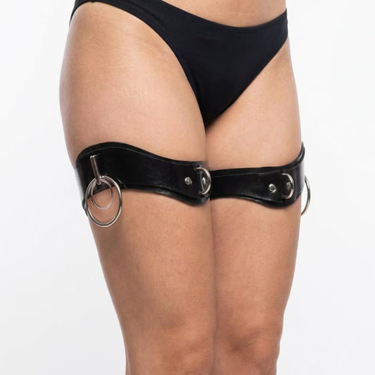 The Ilaria double ring thigh cuffs are shown on a woman on a white background