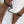Load image into Gallery viewer, A close-up of a woman’s ankles cuffed in the black Double Lock Legcuffs is shown.
