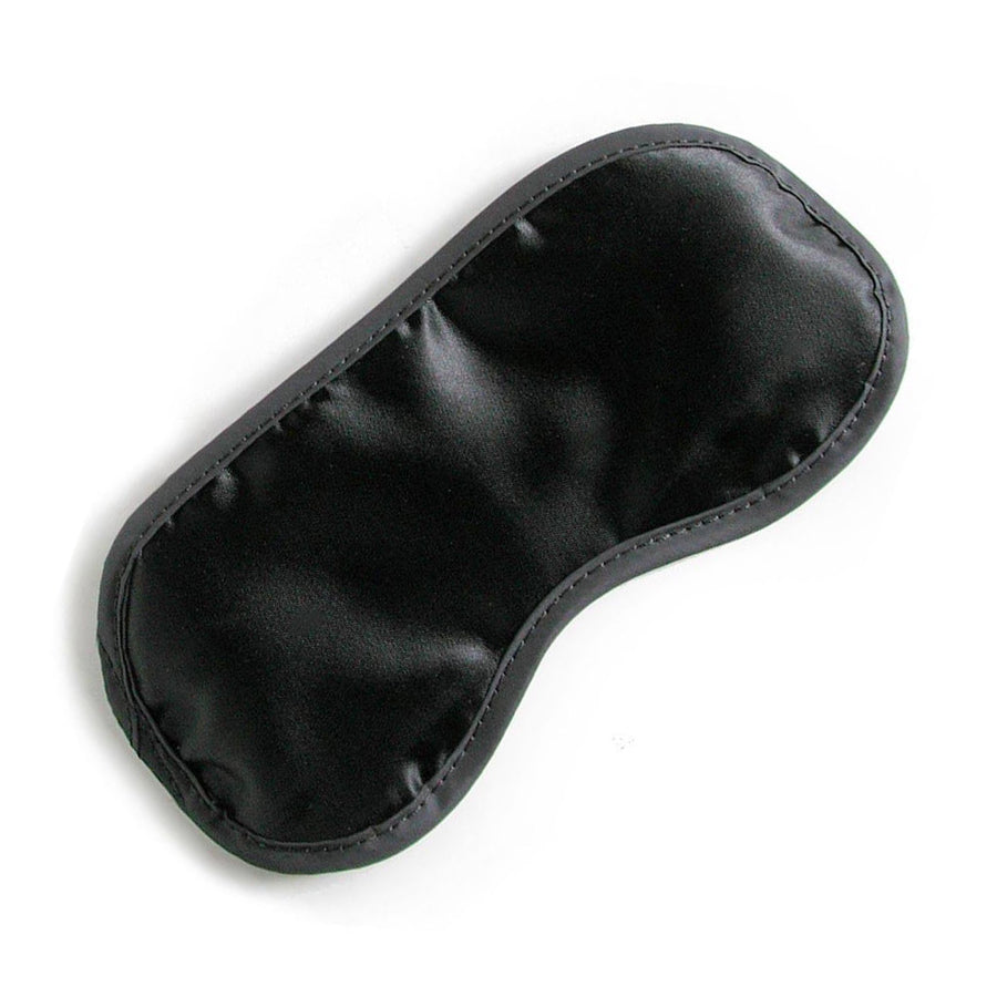 Cathy's Satin Blindfold in black is displayed against a blank background. It is a classic blindfold made of shiny black satin. 