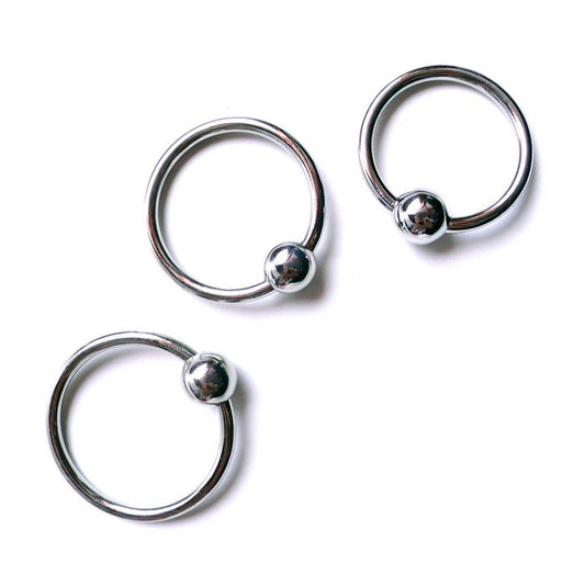 The metal head ring with ball is shown on a white background. 