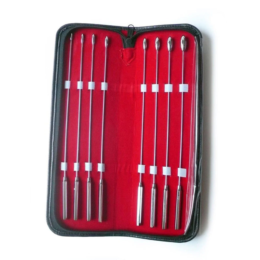 The 8 Piece Rosebud Urethral Sounds Kit is shown against a blank background. The book-shaped case has a black exterior and red interior and is unzipped, showing the silver sounding rods, which are lined up from left to right from smallest to largest. 