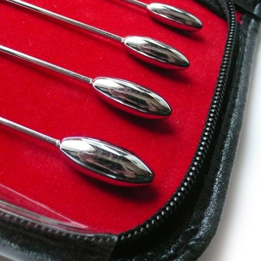 The tips of the four largest sounds from the 8 Piece Rosebud Urethral Sounds Kit are shown against the blank background.