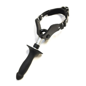 The Dildo Attachment For Scott Paul's Humiliator Gag is shown attached to the Humiliator Gag against a blank background.