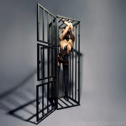 Model inside a metal cage on a gray background