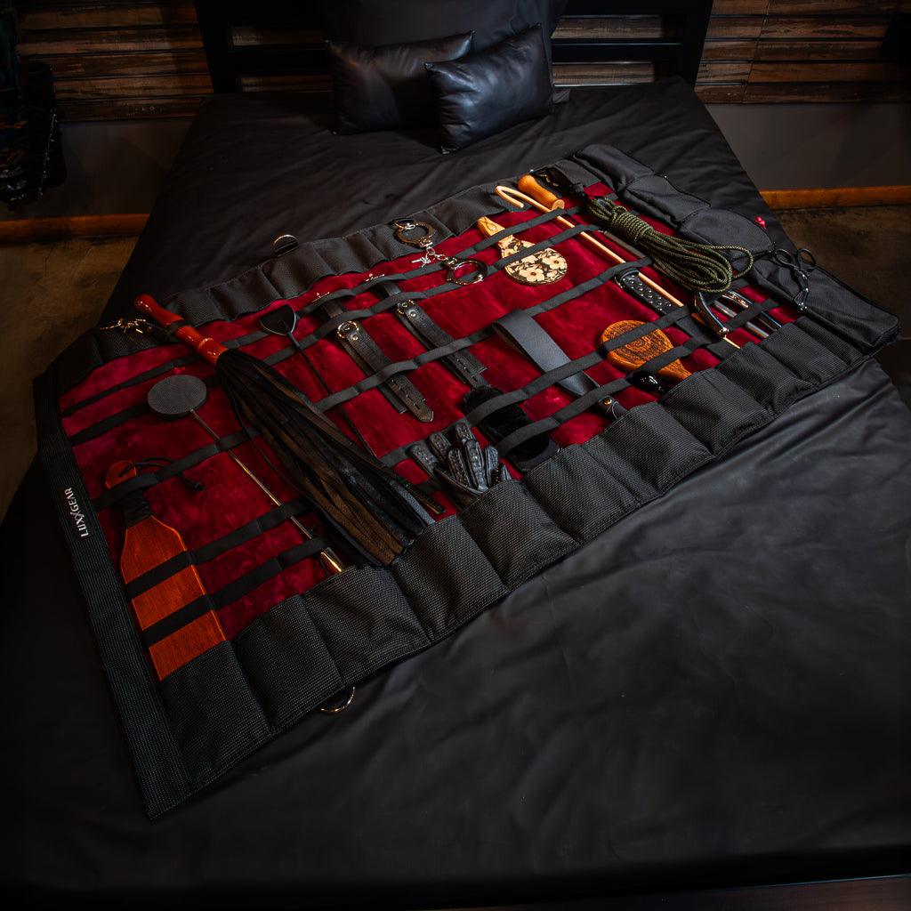 The KinkBag spread open diagonally across a full-size mattress to give a sense of scale.