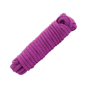The Cotton Bondage Rope in purple is shown neatly coiled up against a blank background.