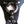 Load image into Gallery viewer, A close-up of the center of the black leather La Strap On harness, showing the two different-sized silver metal O-rings that it comes with.
