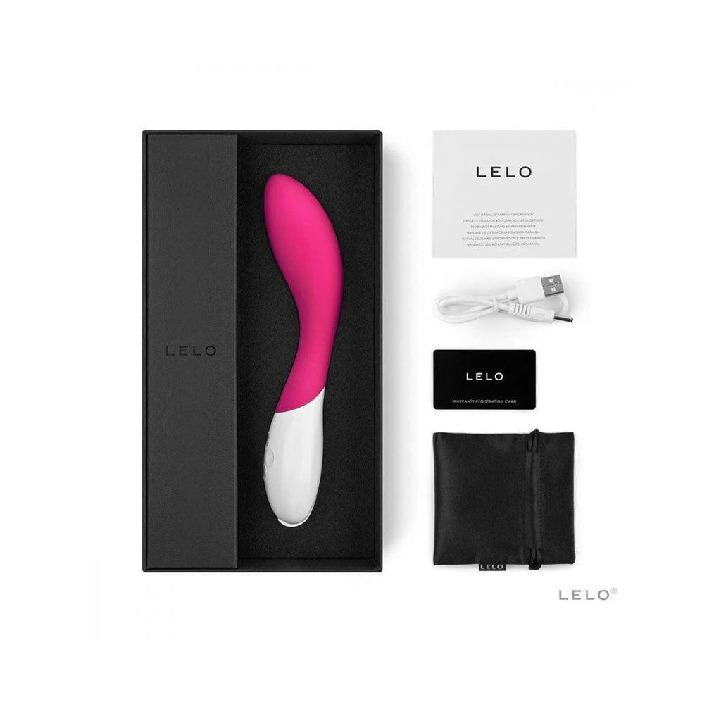 The Lelo Mona 2 G stop vibrator is shown in it's package with all it's inlcuded items against a white background.