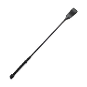 The black Flexicrop spanking implement is displayed against a blank background.