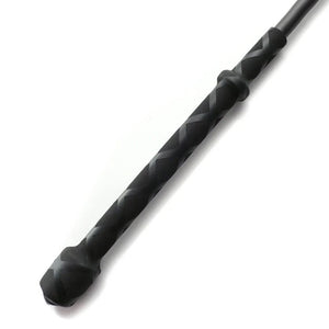 The black Flexicrop spanking implement is displayed against a blank background.