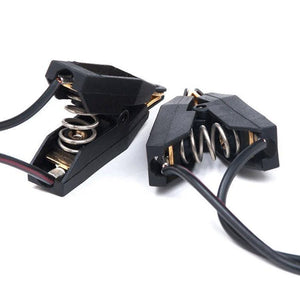 A pair of Mystim Barry Bite Bi-Polar Clamps are displayed against a blank background. 
