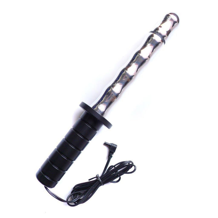 The Mystim Mighty Merlin Dagger-Dildo is displayed against a blank background. It is a thin, silver aluminum dildo with bumps running down it, and a large black handle.