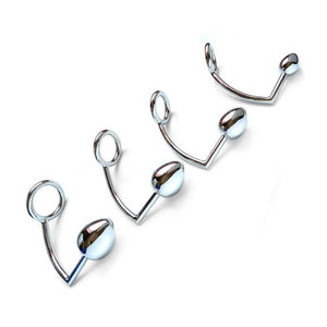  Four different-sized Trailer Hitch Kingpin anal plugs are displayed against a blank background from largest to smallest.