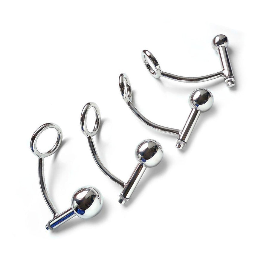  Four different-sized stainless steel Trailer Hitch Power Train plugs are displayed against a blank background from largest to smallest.