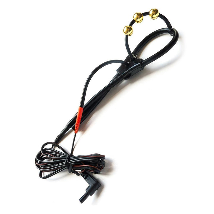 The Mystim Pearly Pete is displayed against a blank background. It is a ring with an arch over the top made of black silicone with three gold balls across the arch.