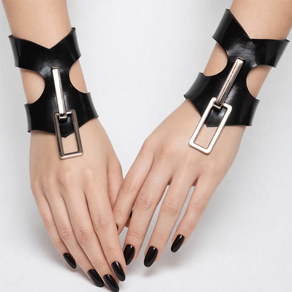 The Secure V cut cuffs are shown on a womans hands against a white background. 
