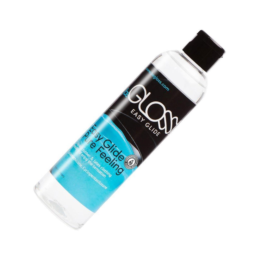 A bottle of the beGLOSS Easy Glide Premium Latex Lube is shown against a white background. 