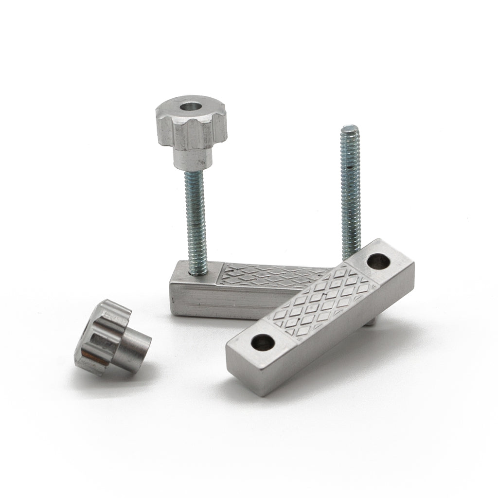 One Extreme Adjustable Nipple Clamps is shown disassembled against a blank background.