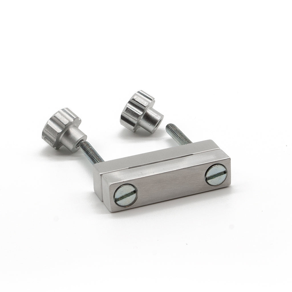 One Extreme Adjustable Nipple Clamps is shown on its side against a blank background.