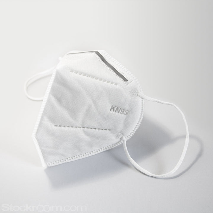A white KN95 Respirator Mask is displayed against a blank background.