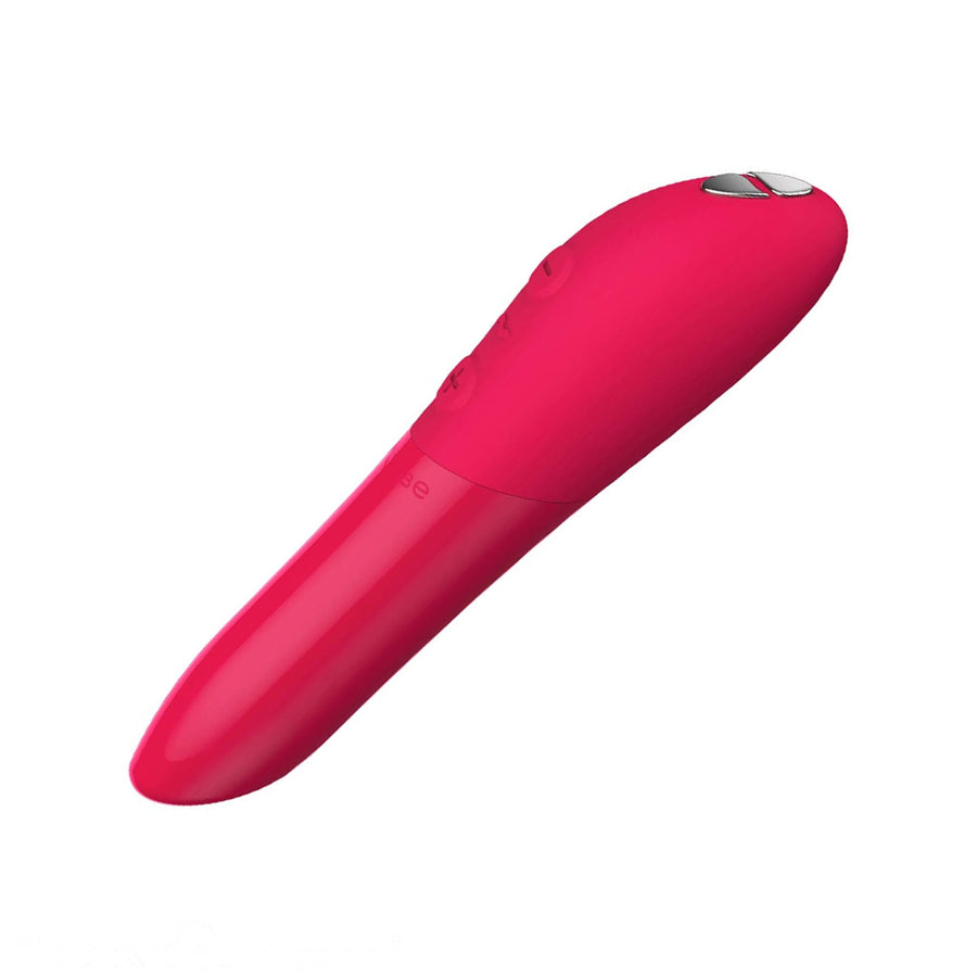 The We-Vibe Tango X Bullet Vibrator in Cherry is shown against a blank background. The vibrator is hot pink and shiny with a matte silicone handle, which has three buttons on it.