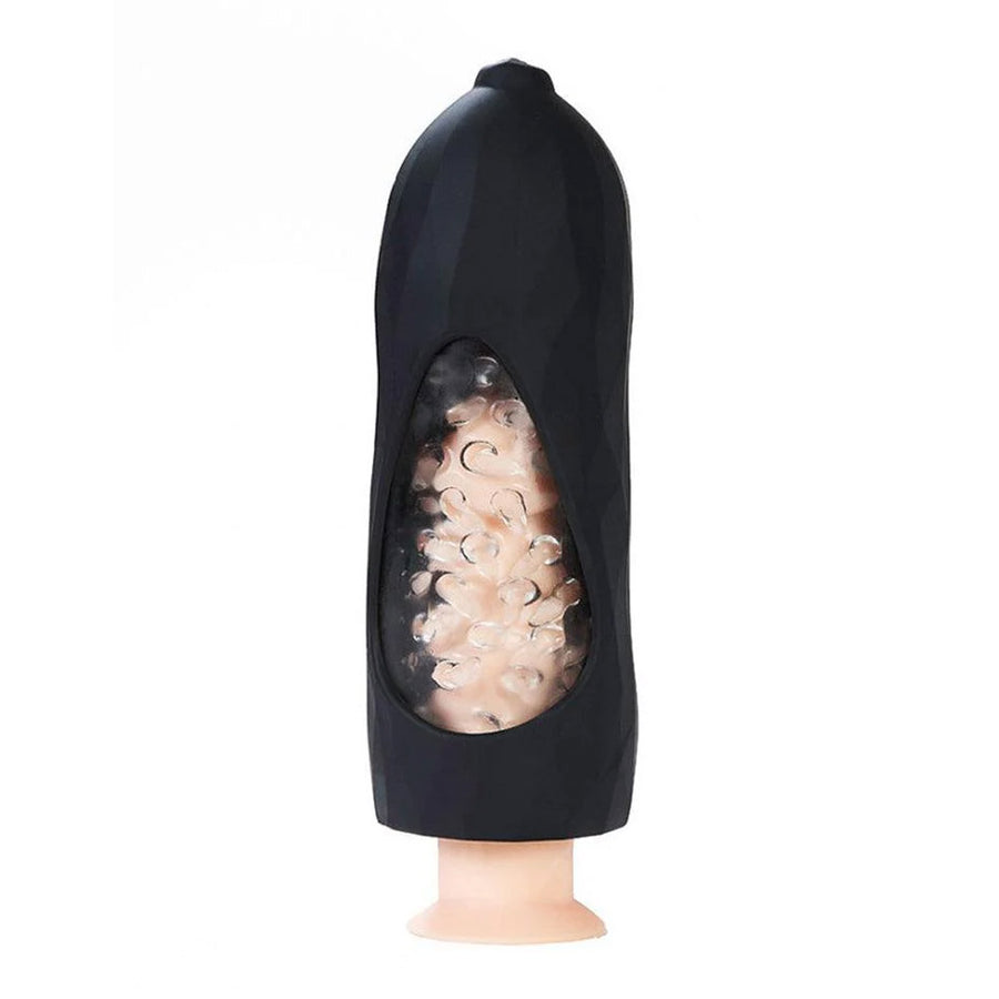 The VeDO Hummer Max Stimulation Vibrating Sleeve is shown against a blank background with a dildo inside it.