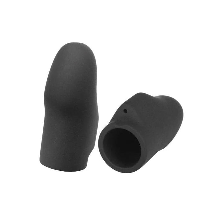 A pair of Electrastim Silicone Noir Explorer Finger Sleeves are shown against a blank background. They are matte black and are shaped like finger tips with a small cable receptor on the back.