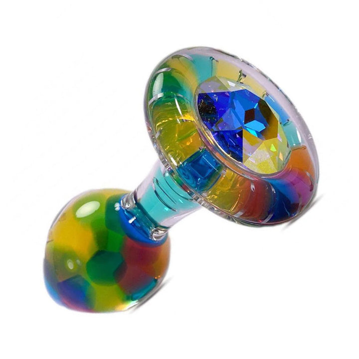 The Funfetti Butt Plug With Crystal Base is shown in Aurora Borealis against a clear background. The plug has a kaleidoscopic array of colors and a large crystal on the base.